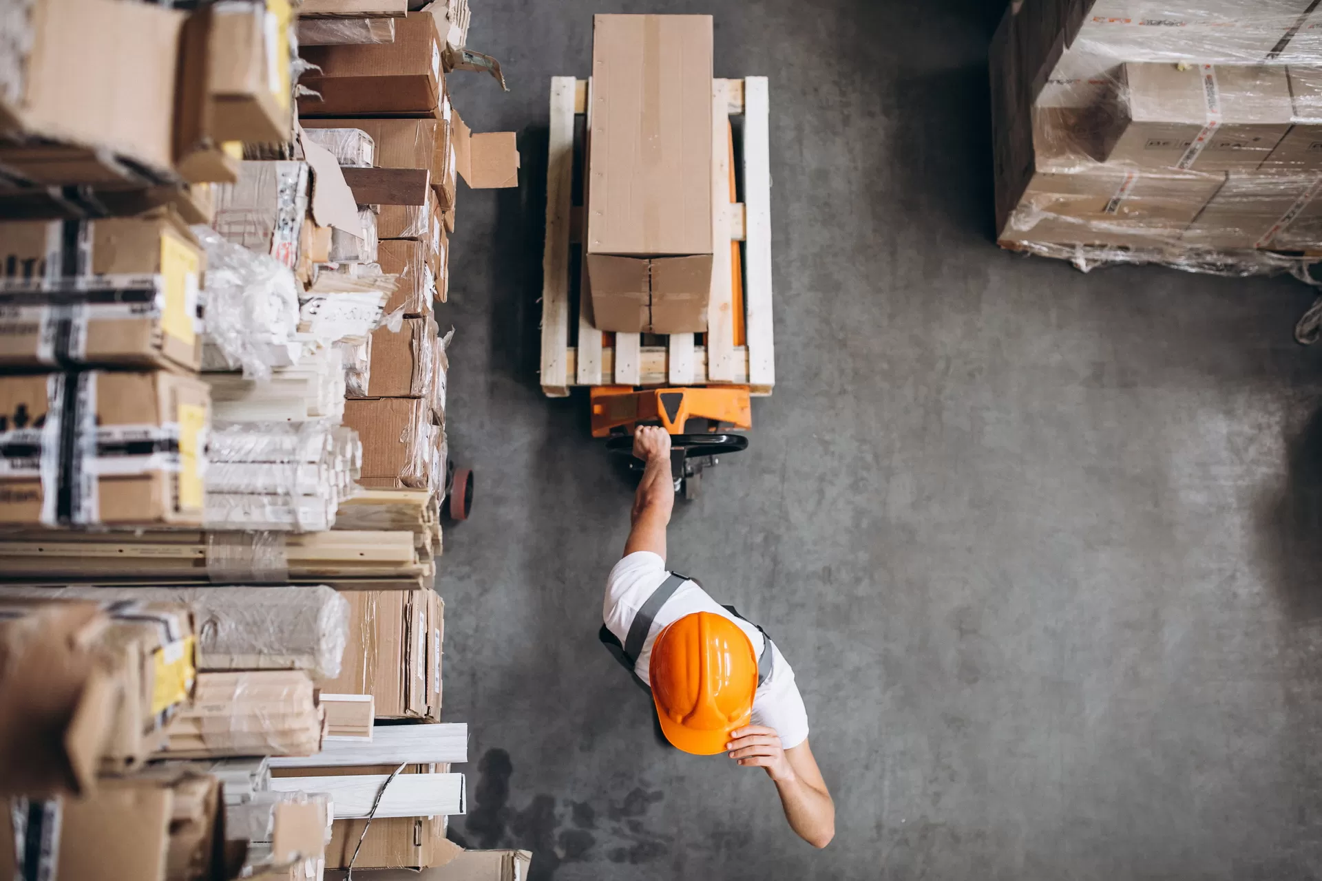 young-man-working-warehouse-with-boxes.jpg